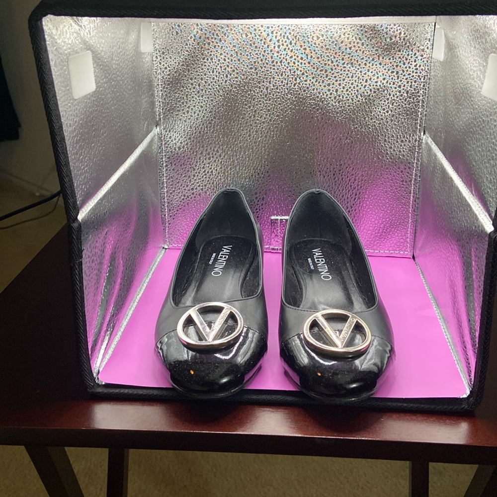 Valentino flat shoes size 7 used twice very comfortable. No returns